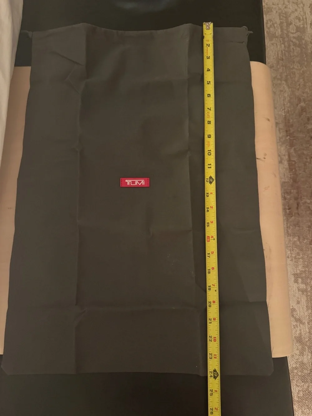 Tumi Black Dust Cover with Red Logo Patch